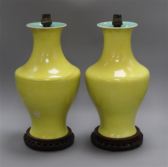 A pair of Chinese yellow ground vase table lamps (one a.f.)